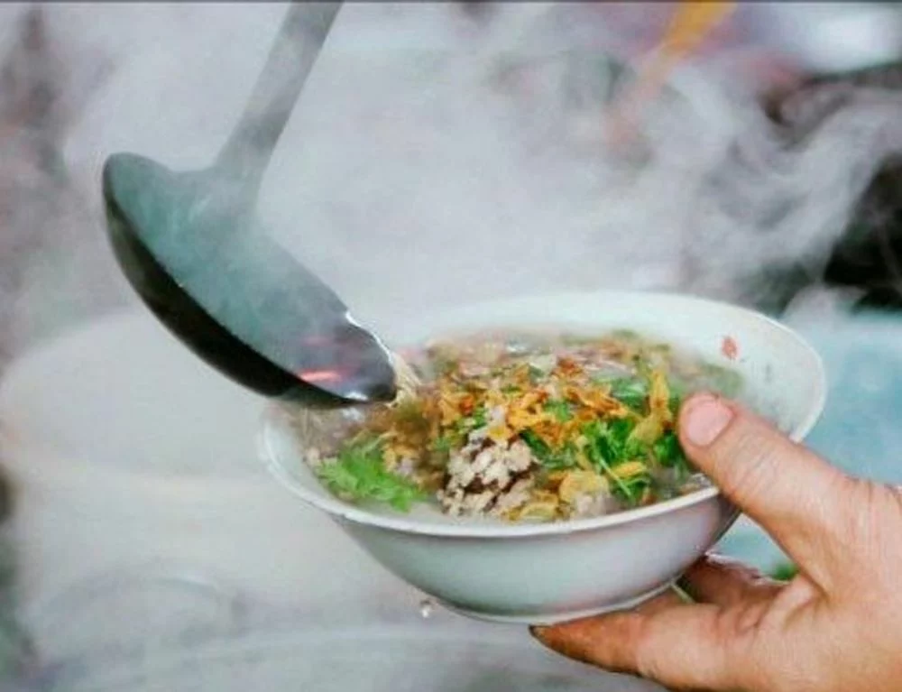 Hot plain rice flan - Ideal street food for cold days in Hanoi
