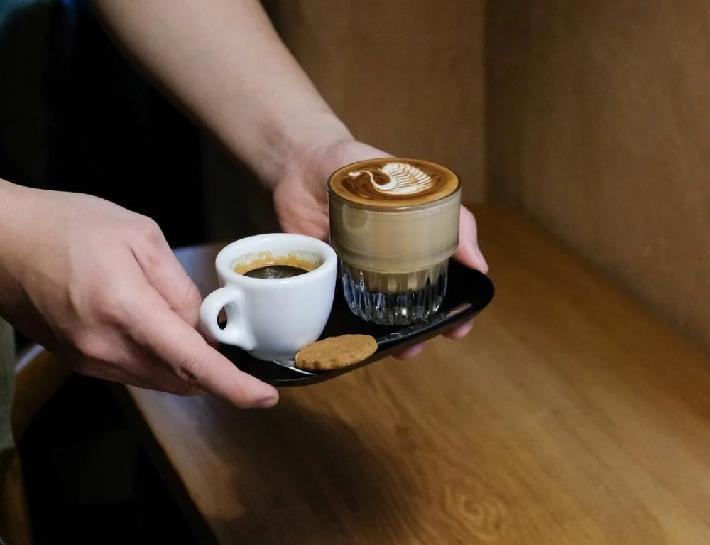 Enjoy a cup of coffee while watching Hanoi under the rain
