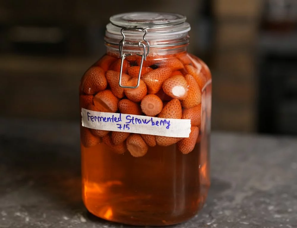 Fermentation is another key practice, allowing ingredients to be preserved and fully utilized rather than wasted