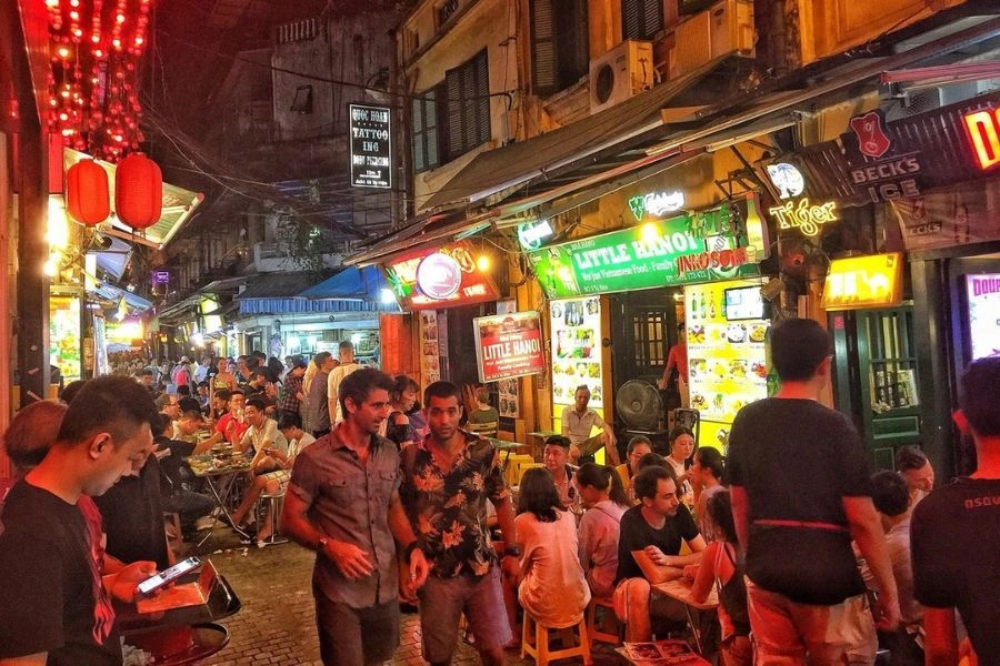 Hanoi after dark: bustling beer streets, late-night food stalls, and the city’s unmistakable energy