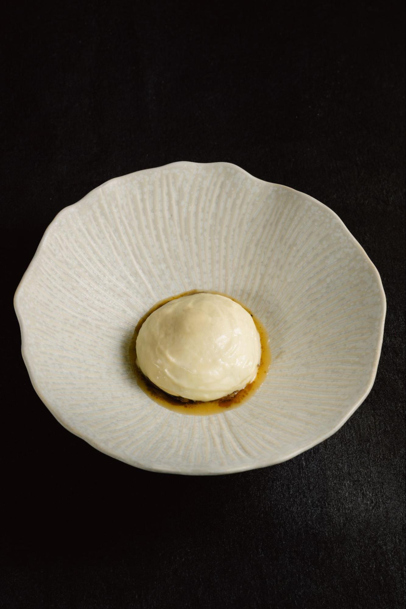 Silky corn purée meets fire-kissed kernels, forming the comforting foundation of Mountain Corn