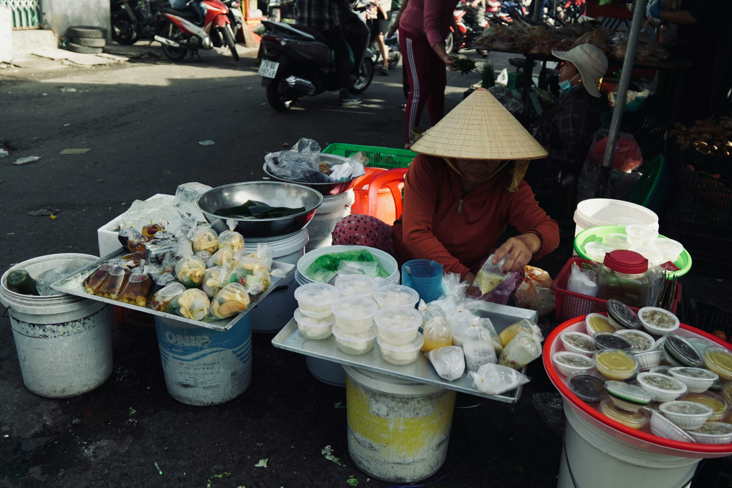 hanoi-locals-eating-street-food-traditional-dishes-scaled