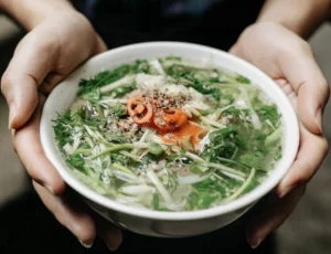 Pho tai lan is a must-try if you enjoy the flavor of stir-fried rare beef paired with soft, chewy rice noodles.