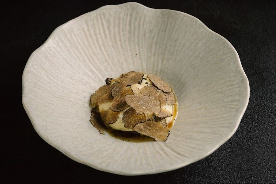 Finished with winter black truffle, Mountain Corn balances smoke, earth, and warmth