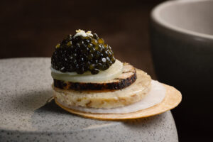 eel-and-caviar-dining-bridge-heritage-luxury-scaled