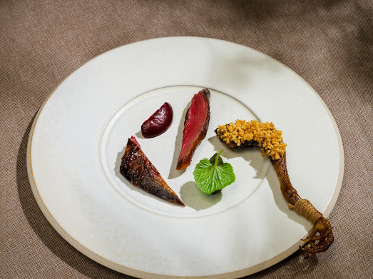 Rich, delicate, and expressive, pigeon forms the foundation of this seasonal composition.