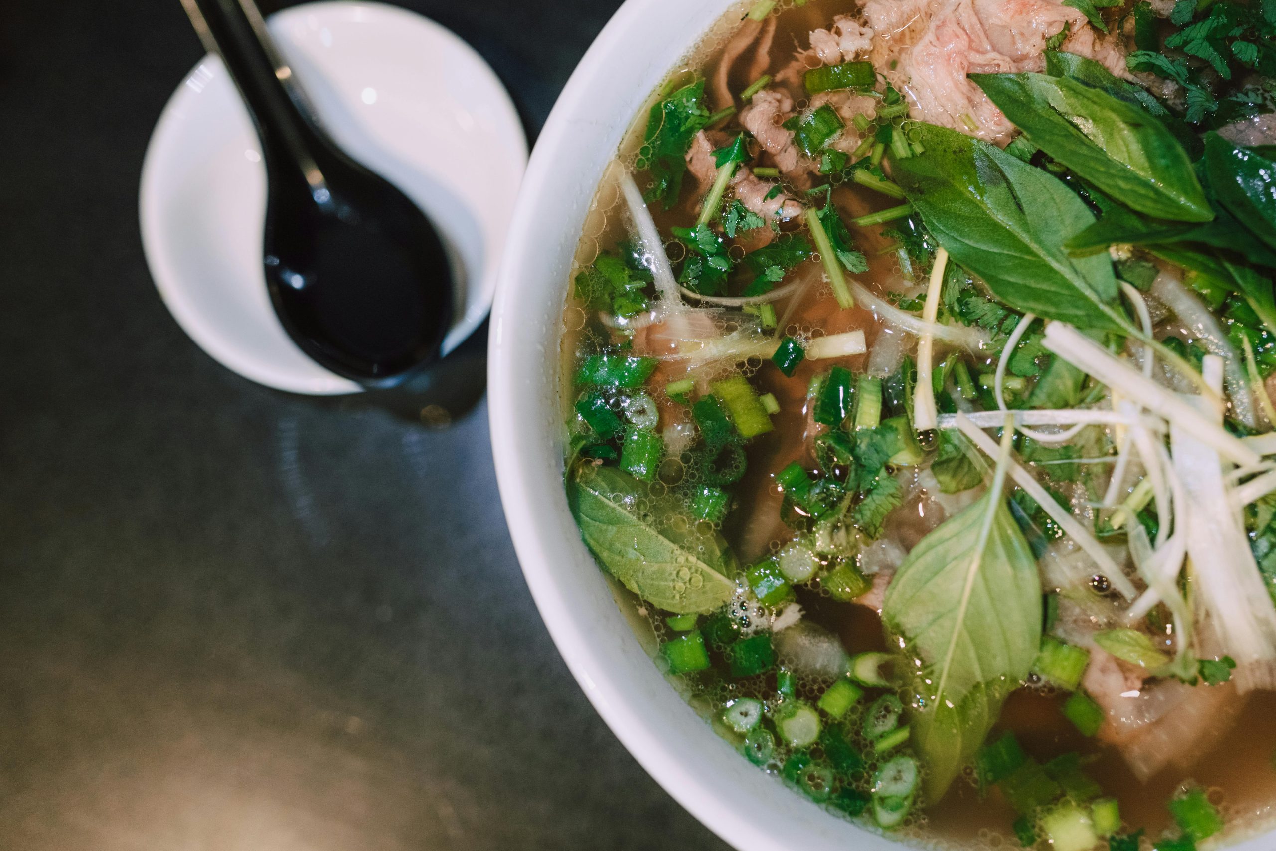 Traditional Hanoi breakfast with pho and Vietnamese street food