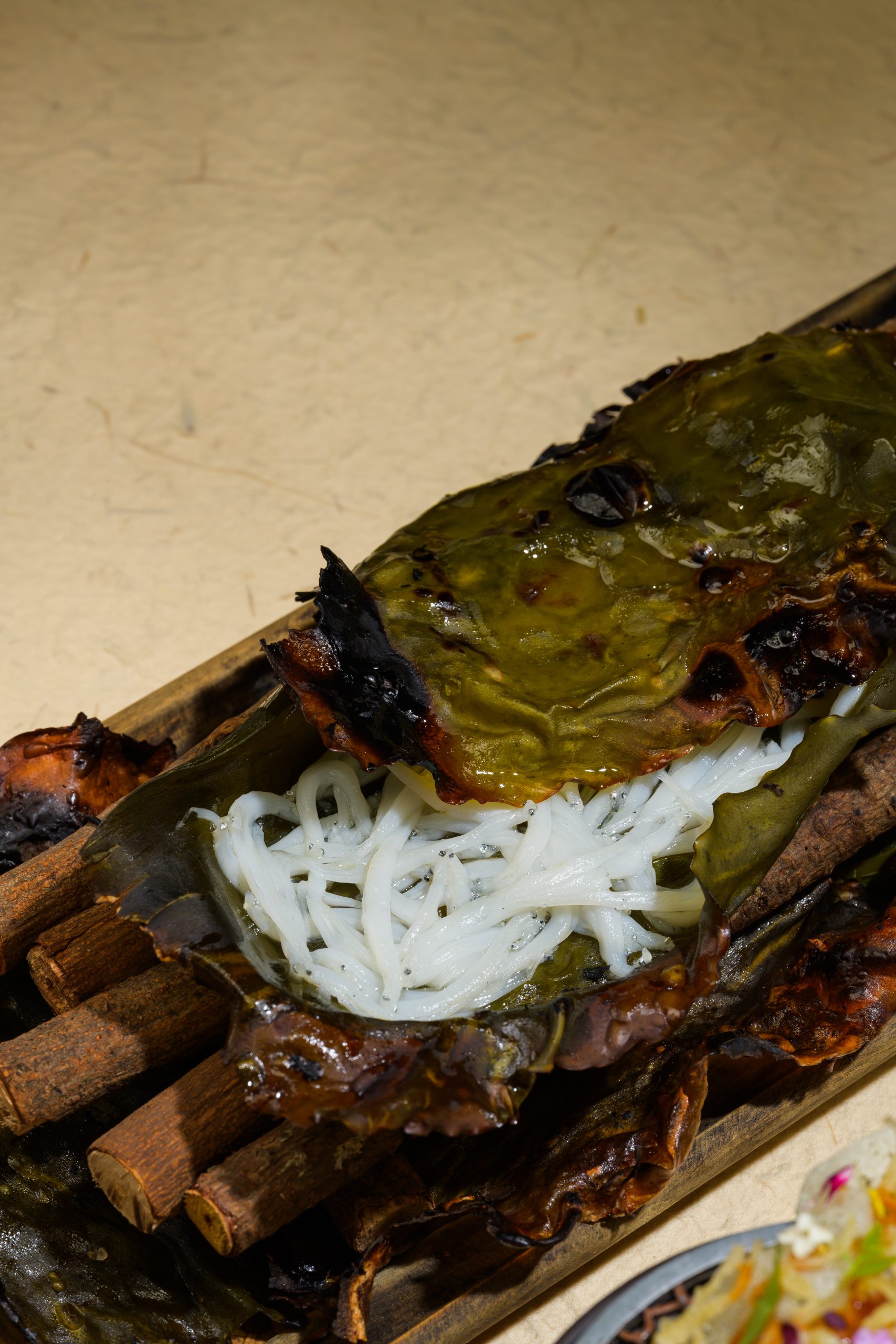 Kombujime technique enhancing umami in Kinmedai seasonal seafood through curing with kombu seaweed