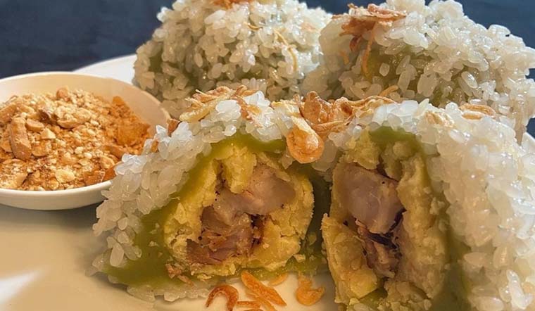 Traditional xoi khuc made with Vietnamese sticky rice, mung beans, and pork