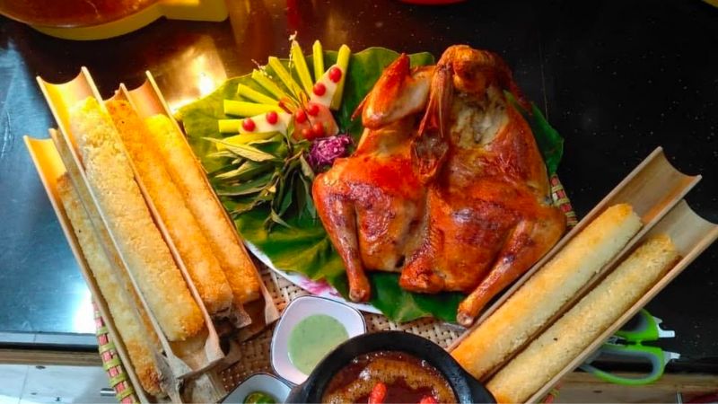 Cơm lam paired with grilled chicken pork skewers and river fish
