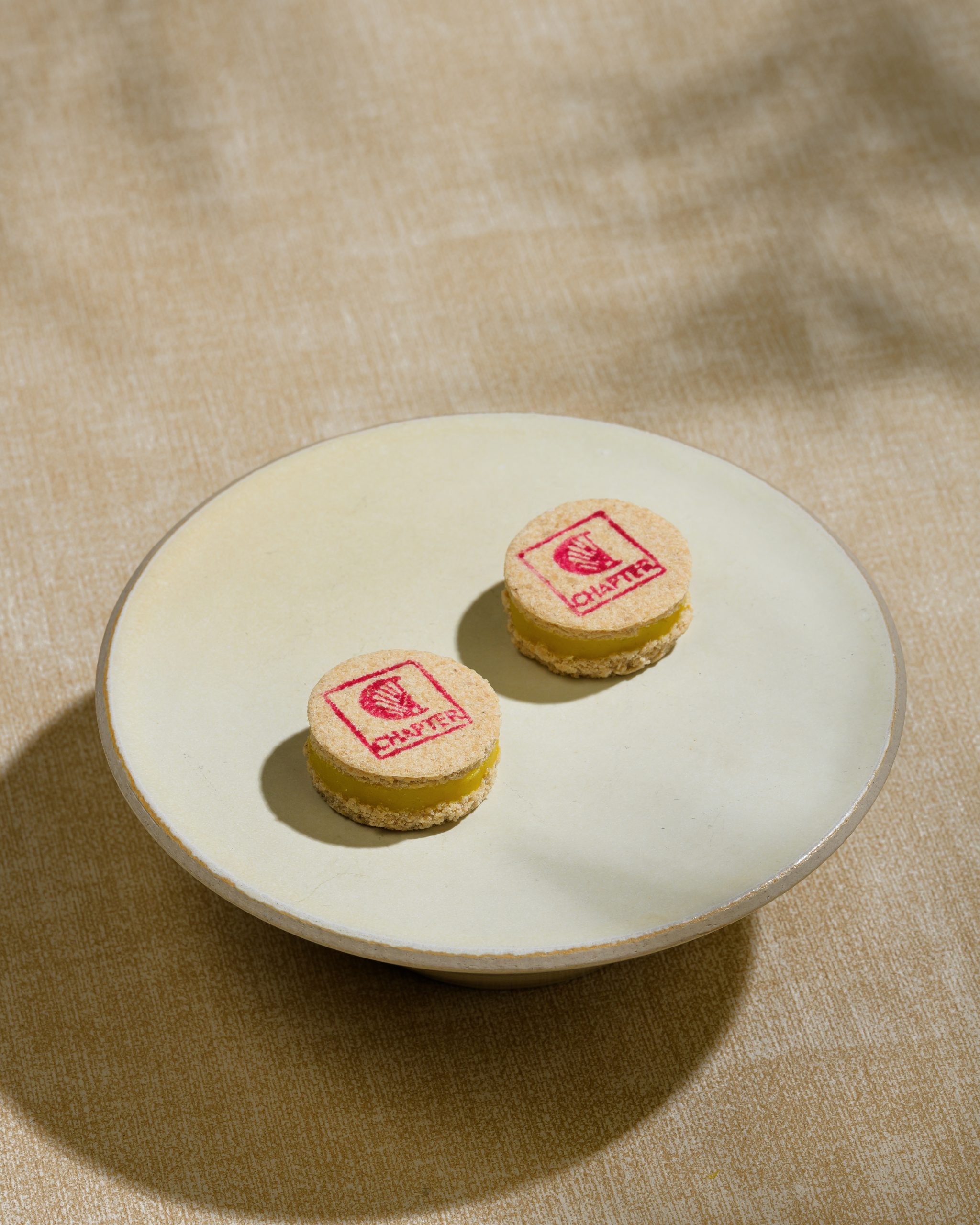 Jasmine macaron served as a Petit Four at Chapter Dining