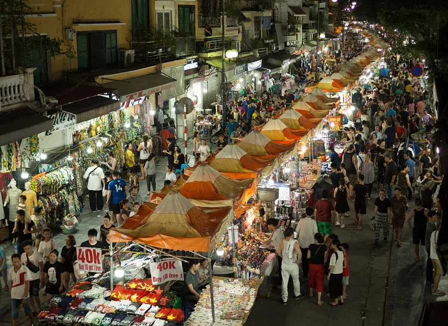 Vendors working inside a traditional Hanoi market