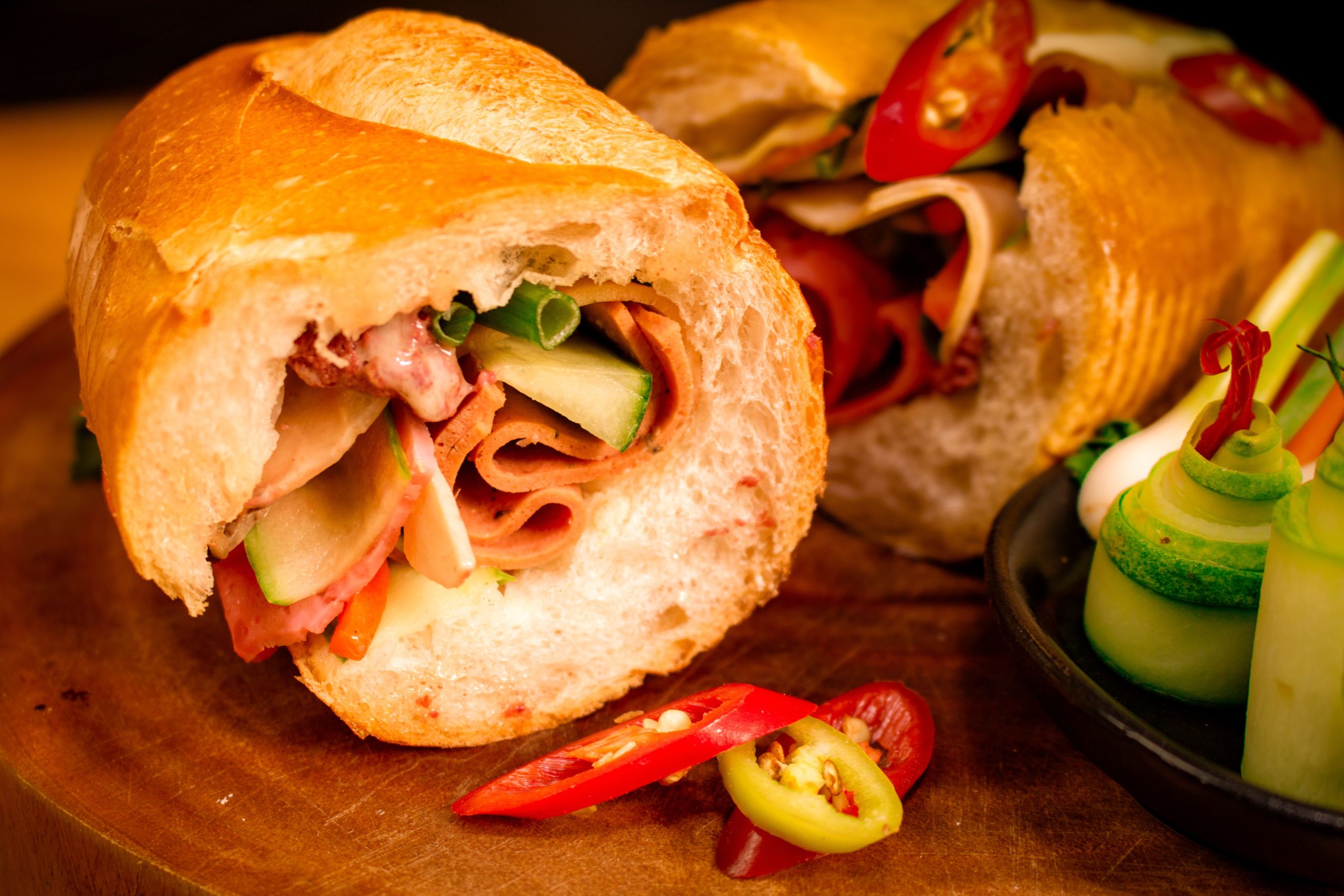 Traditional Vietnamese banh mi with crispy baguette, fresh herbs, and local ingredients