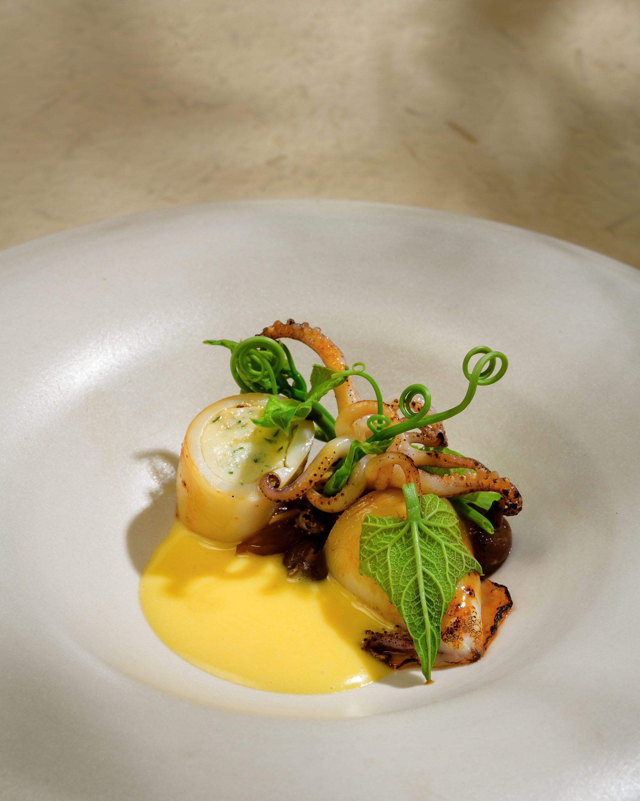 Baby squid with pig’s ear and black ginger in Chapter’s Lucent menu