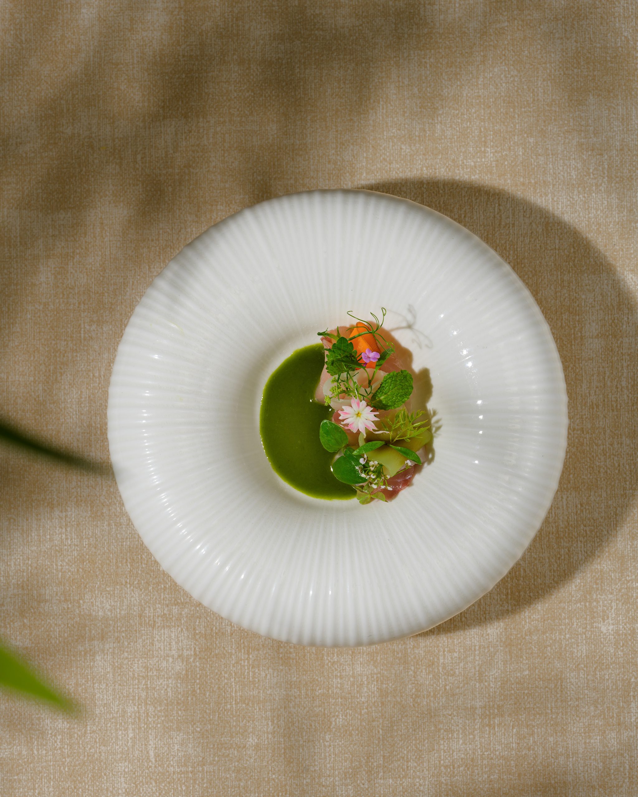 Guest reviewing Chapter Dining’s seasonal tasting menu before booking