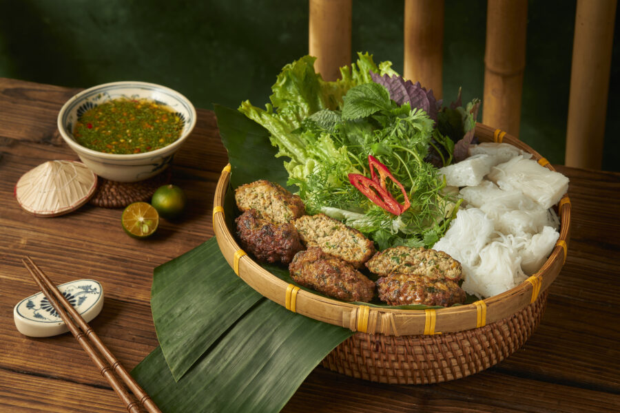 Hot chả rươi with crisp edges, a soft centre and fragrant tangerine peel