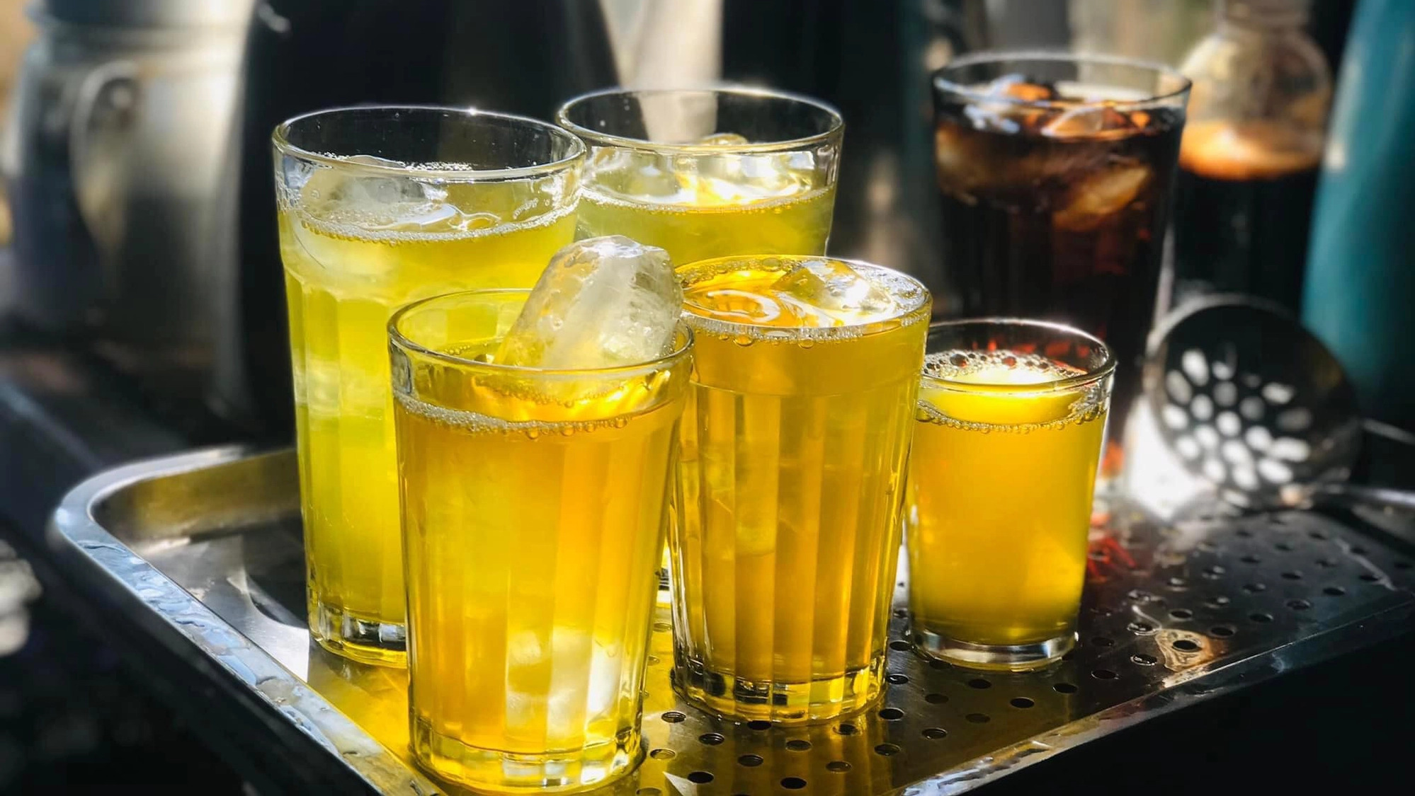 Iced trà đá served at a pavement stall in Hanoi Old Quarter