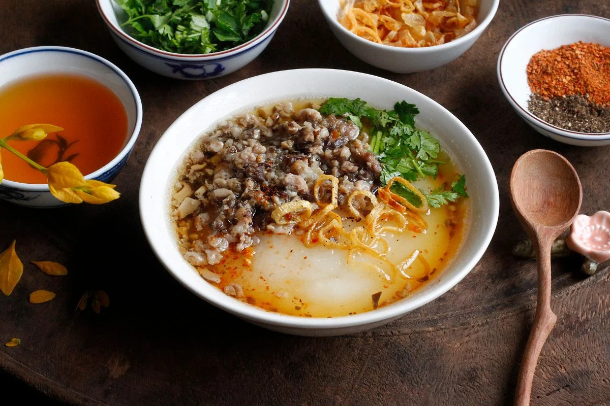 Flatlay of different regional Vietnamese rice cake styles showcasing rural heritage and traditions.