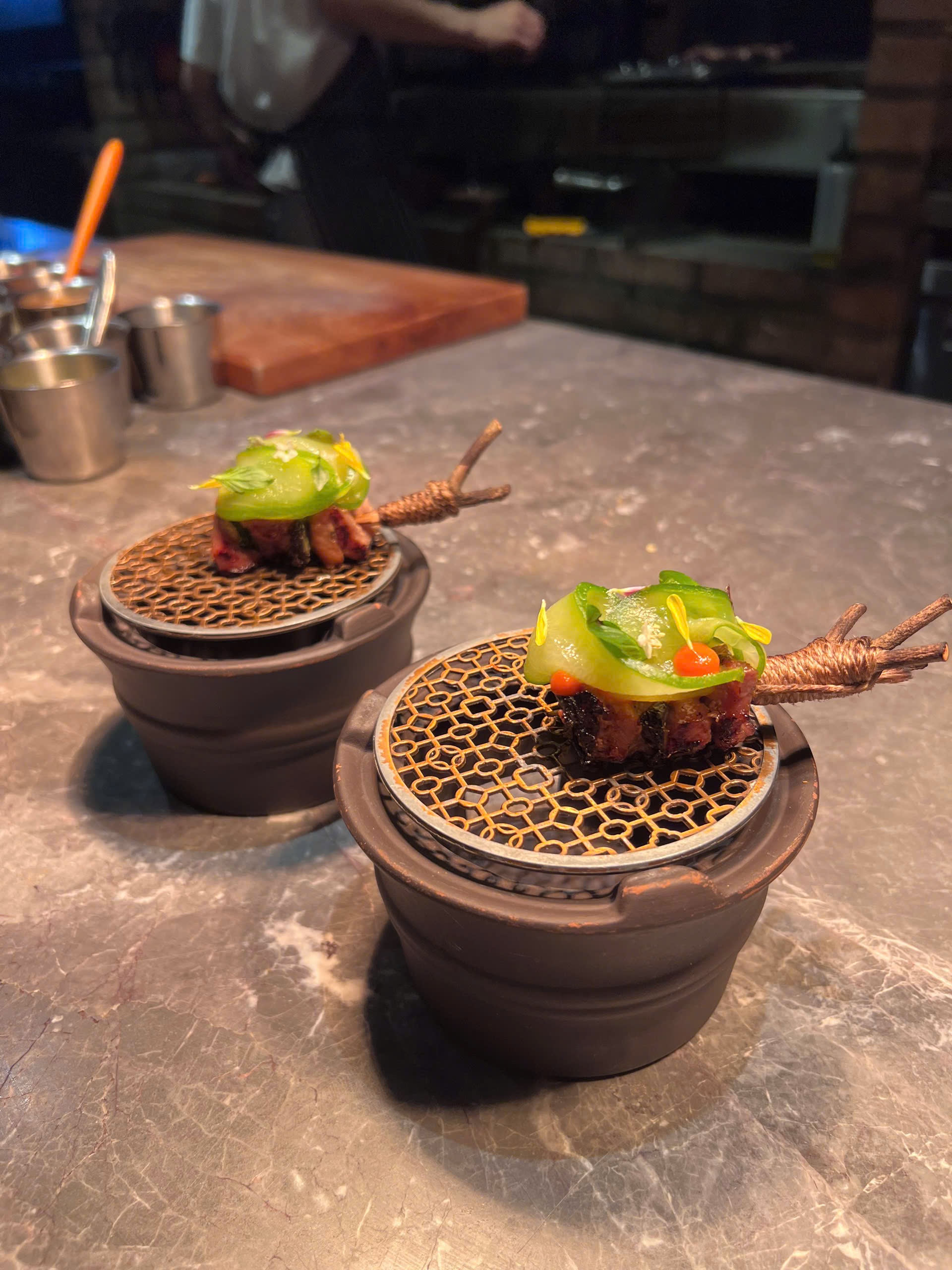 From a daikon cigar to charcoal-grilled pork skewers, familiar ingredients take on new forms.