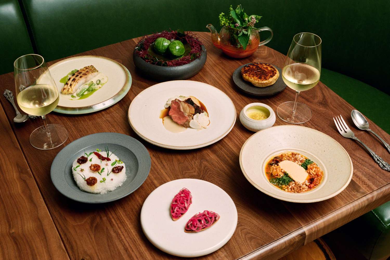 Guests reviewing an à la carte menu before ordering dinner
